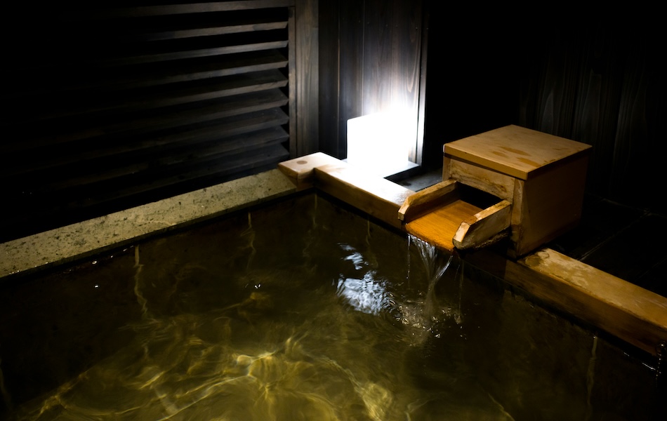 onsen ryokan L’onsen di un ryokan giapponese